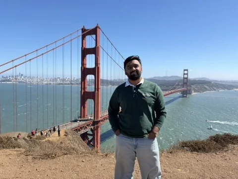 Adnaan in front of the Golden Gate Bridge
